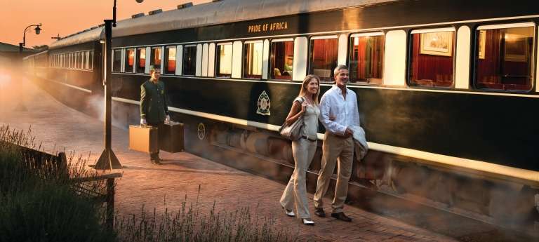 A couple on the platform of Rovos Rail, South Africa
