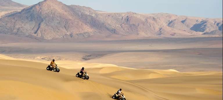 Quad biking through the dunes is a popular activity during August